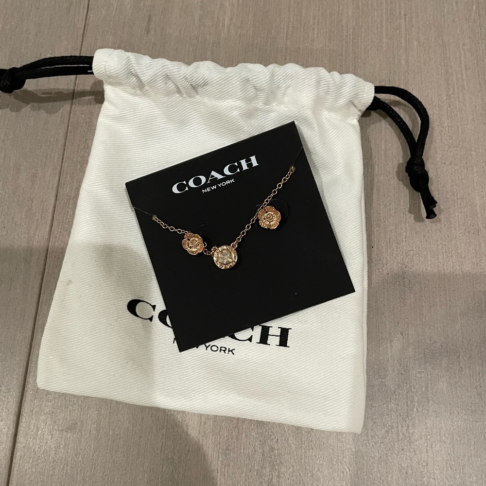 Coach rose gold earring and necklace set